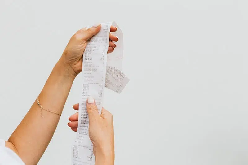 Lady holding Thermal Paper